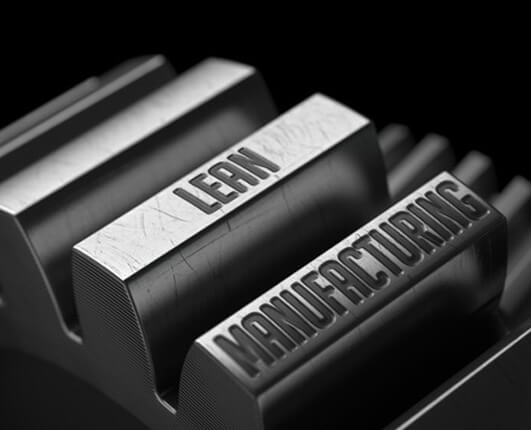 The word "lean" and "manufacturing" on the edge of the gear wheel