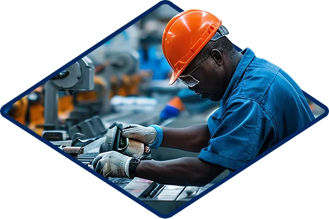 Man Working In Industrial Work Place
