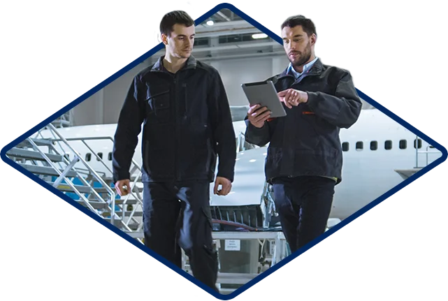 Mc Aerospace Defense Men Wallking With Clipboard